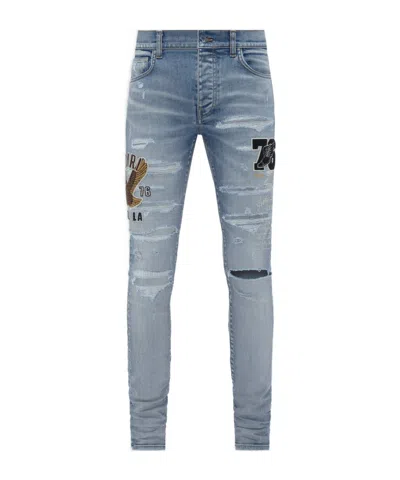 Amiri Logo-appliqué Skinny Jeans In Blue