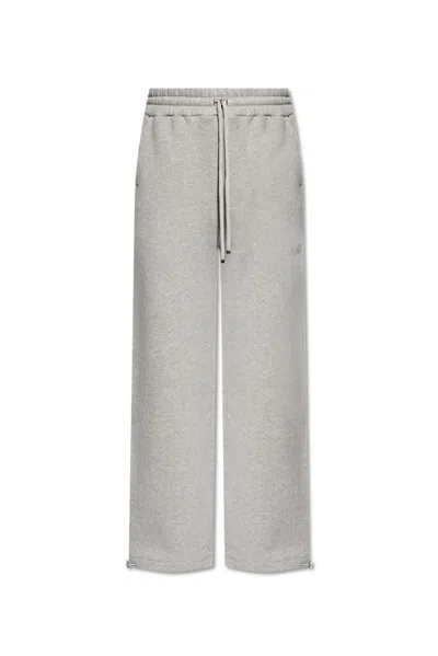 Amiri Logo Embroidered Drawstring Jogging Pants In Grey