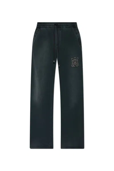 Amiri Logo Patch Washed Track Pants In Black