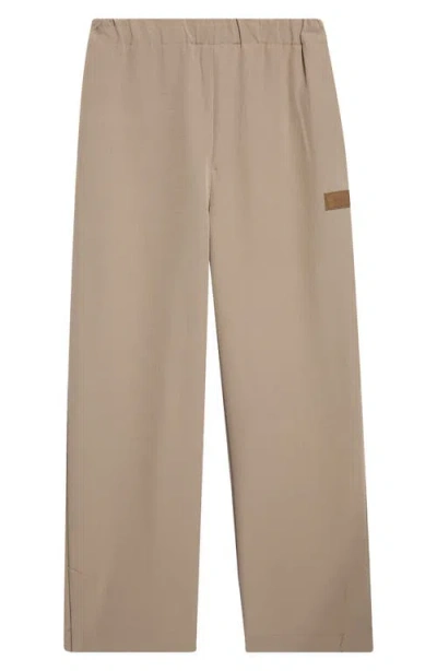 Amiri Logo Patch Stretch Cady Track Pants In Neutral
