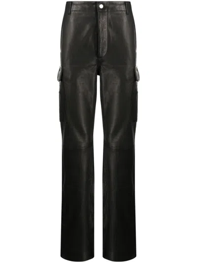 Amiri Logo-plaque Polished-finish Trousers In Black