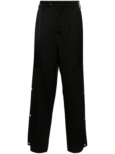 Amiri Logo-plaque Straight-leg Trousers In Black