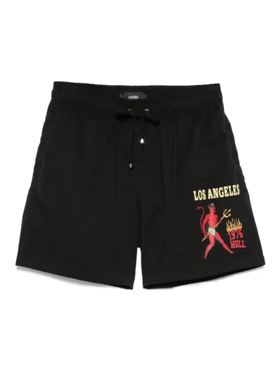 AMIRI LOGO-PRINT SWIM SHORTS