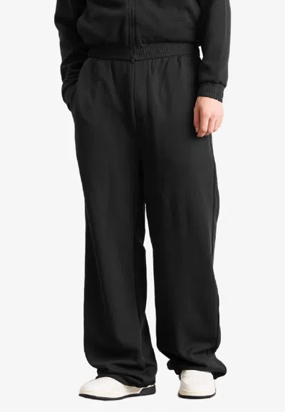 AMIRI LOGO PRINT TRACK PANTS