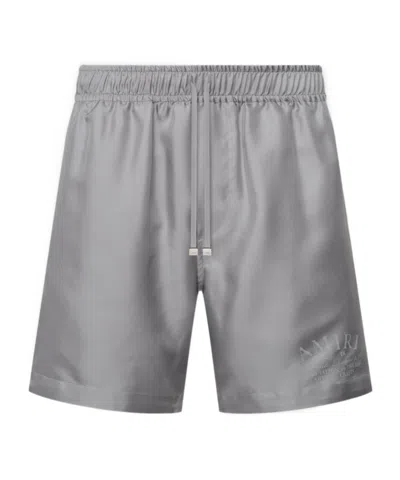 Amiri Logo Printed Swim Shorts In Animal Print