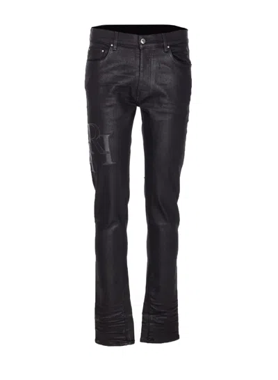 AMIRI LOGO SKINNY JEANS