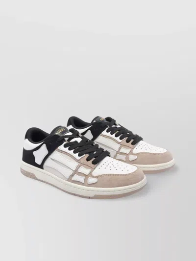 AMIRI LOW TOP DISTRESSED SNEAKERS