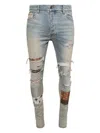 Amiri Distressed Stretch Denim Jeans With Faded Effect In Blue