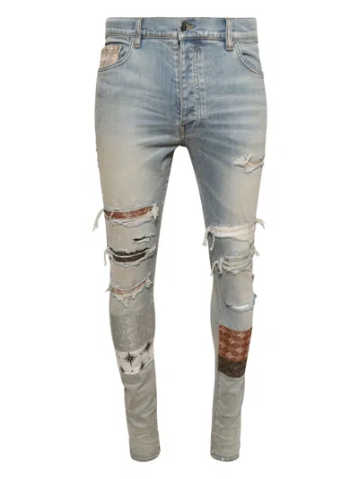 AMIRI MA QUAD ARTPATCH JEANS