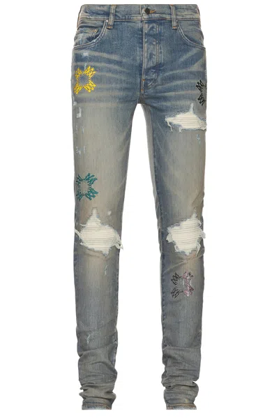 Amiri Ma Quad Cut Out Mx1 Jean In Antique Indigo