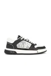 Amiri 'ma Quand' Black And White Low Top Sneakers With Logo Patch On The Tongue And Logo Lettering On The In Multicolor