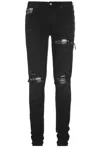 Amiri Slim Fit Distressed Trousers With Rivet Detailing In Vintage Black
