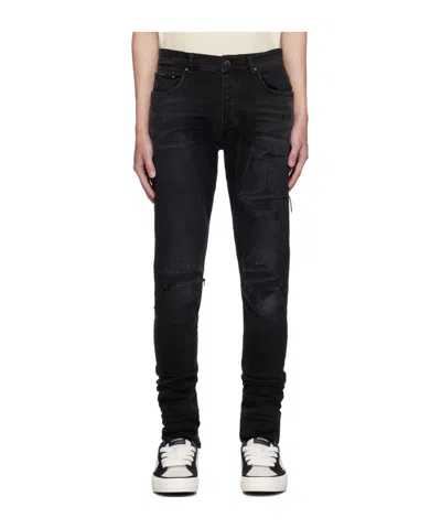 AMIRI MA VARSITY REPAIR FADED DENIM PANTS