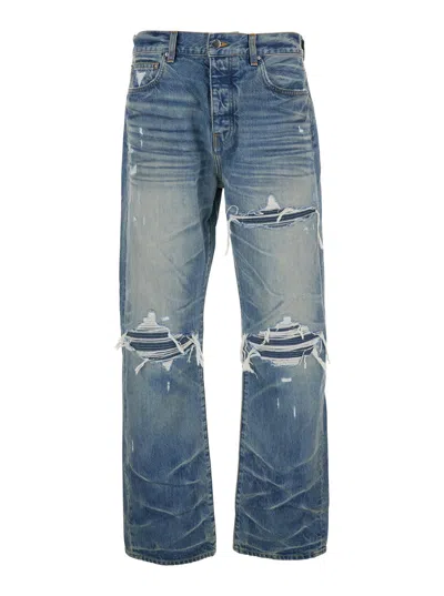 AMIRI AMIRI MEN BLUE JEANS WITH RIPPED DETAILS ON THE FRONT AND LOGO PATCH ON THE REAR IN DENIM MAN