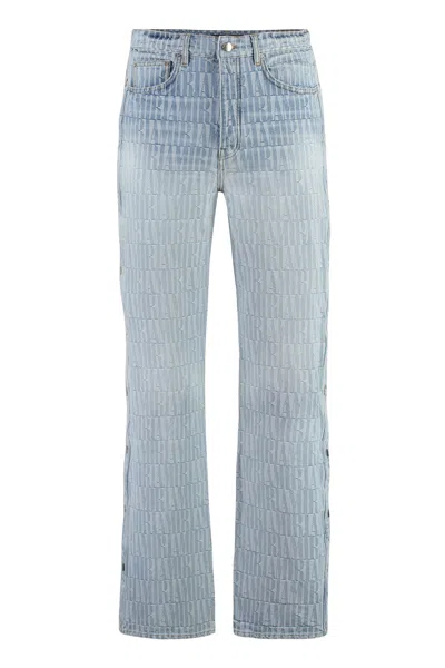 AMIRI MEN'S BLUE SNAP BUTTON JEANS WITH SIDE SLITS AND SILVER METAL RIVETS