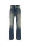Amiri Slashed Boot Cut Jean In Blue