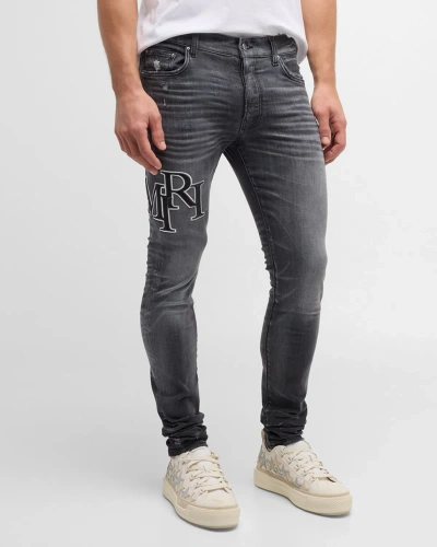 Amiri Men's Faded Skinny Jeans With Staggered Logo In Faded Black