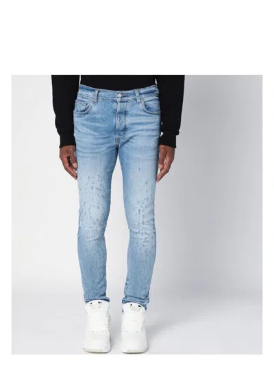 Amiri Men's Light Washed Skinny Jeans With Wear