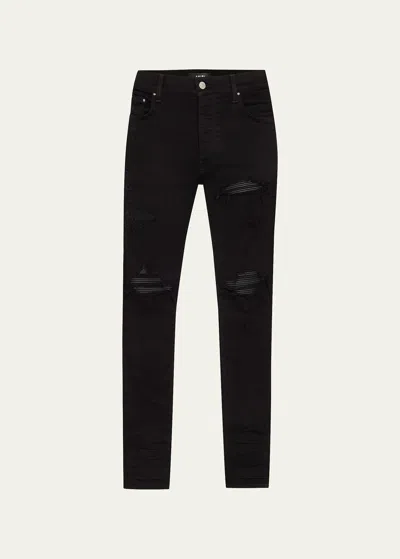 Amiri Slim Fit Distressed Trousers With Rivet Detailing In Black