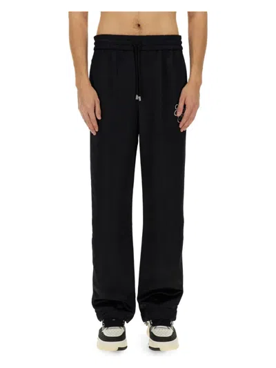 AMIRI MEN'S PANTS WITH EMBROIDERY