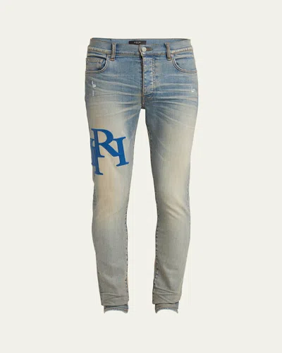 Amiri Men's Staggered Leather Logo Skinny Jeans In Antique Indigo