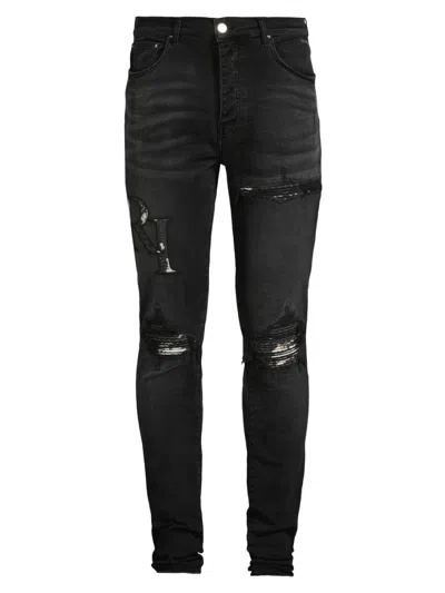Amiri Men's Staggered Logo Skinny Jeans In Black