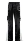 AMIRI MEN'S TECHNICAL FABRIC PANTS WITH ADJUSTABLE ANKLE DRAWSTRINGS AND SIDE STRIPES IN BLACK