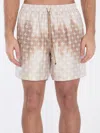 Amiri Monogram Bermuda Shorts In Beige