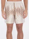 Amiri Monogram Bermuda Shorts In Beige