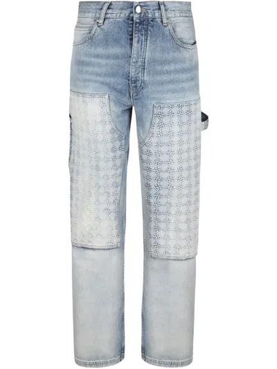 Amiri Monogram-debossed Jeans In Blue