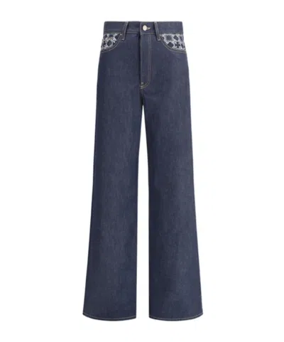 AMIRI AMIRI MONOGRAM PRINTED BAGGY JEANS