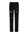 Amiri Skinny-jeans Mit Logo-applikation In Black