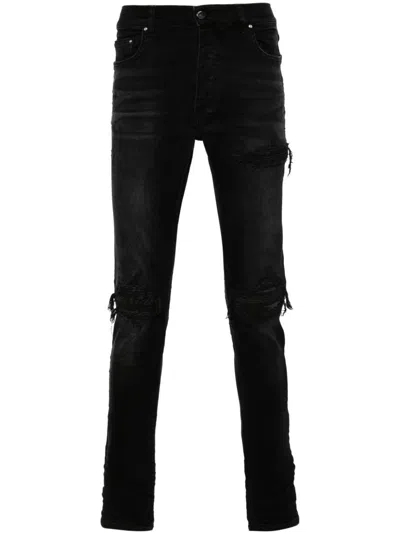 Amiri Wax Ripped-detailed Jeans In Black