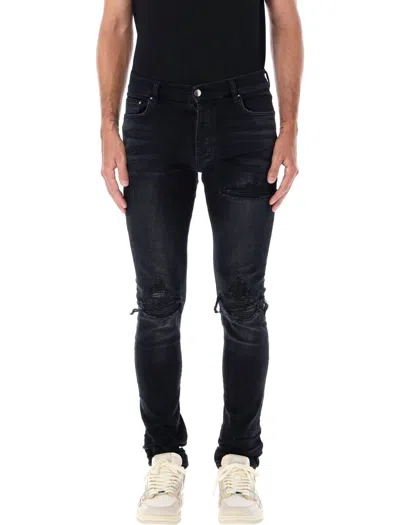 Amiri Mx1 Leather Patch Ripped Skinny Jeans In Aged Black