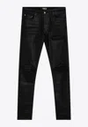 Amiri Skinny Jeans With Distressed Detailing And Five Pockets In Black