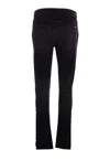 Amiri Slim Fit Distressed Trousers With Rivet Detailing In Black