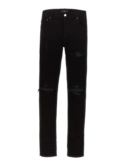 AMIRI JEANS BOOT-CUT - NEGRO