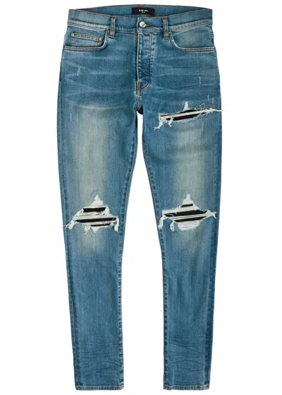 Amiri Mx1 Ripped Slim-leg Jeans In Indigo