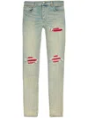 Amiri Mx1 Slim Fit Jeans With Distressed Red Accents In Blue