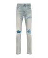 Amiri Mx1 Distressed Leopard Panel Skinny Jeans In Gray