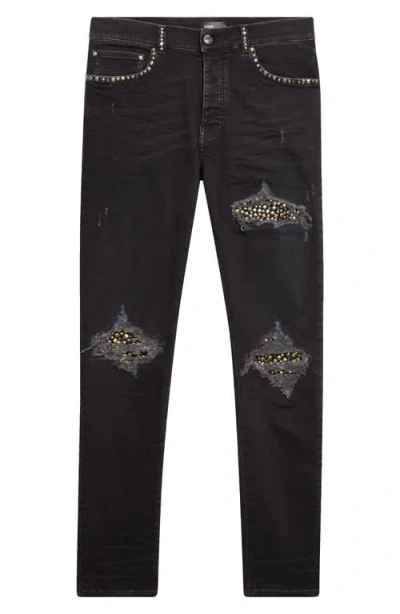 Amiri Mx1 Studded Patch Ripped Skinny Jeans In Animal Print