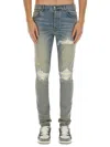 Amiri Light Blue Jeans With Ribbed Details On The Front And Logo Patch On The Rear In Denim Man In Blue