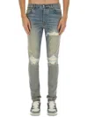 Amiri Light Blue Jeans With Ribbed Details On The Front And Logo Patch On The Rear In Denim Man In Blue