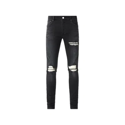 Amiri Mx1 Ultrasuede Slim-fit Jeans In Black