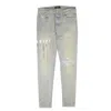 Amiri Paint Drip Logo Jean - Clay In Blue