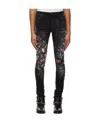 Amiri Paint Print Distressed Skinny Jeans In Black