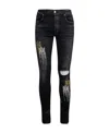 Amiri Paint Splatter-blend Skinny-cut Jeans In Black