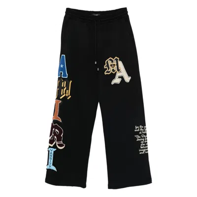 Amiri Applique Track Pants In Black