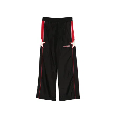 Amiri Straight-leg Logo-embroidered Striped Shell Sweatpants In Black