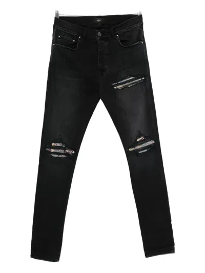 AMIRI PATCHWORK-DISTRESSED COTTON JEANS